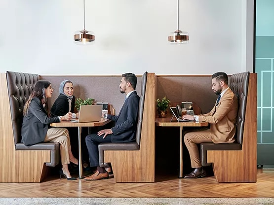 Servcorp Abu Ouf Plaza in Madinah features elegant booth seating, providing clients with a quiet, professional space for meetings and individual work.